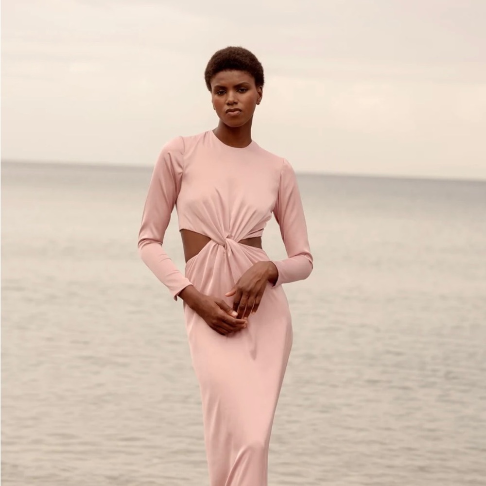 Stunning Agua Clara long sleeve front knot dress by Mayle Vasquez